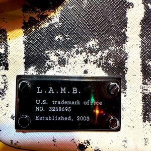 L.A.M.B black and white crossbody.